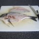 First fillet is removed from the sea bream