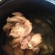 2 cups of chicken and 2 cups of water in the pan.