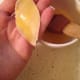 Using the egg wash as glue, brush the back of your decorations, one at a time as you are putting them in place on the crust.