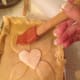 Once the decorations are in place, brush the egg wash on the remainder to the top crust. You want everything coated and shiny but not saturated.