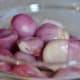 Red Asian Shallots, peeled. When available, I make up large batches of the curry pastes which call for these shallots and freeze the pastes. Image: © Siu Ling Hui