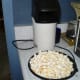 I used an hot air popper to cook the popcorn but lately I use another recycling TIP I leaned from another cook friend of mine. Take a flat bottom paper bag and pour in two cups of popping corn with nothing else. You can pop as little as you need.