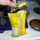 Cut the entire top off the bag of popcorn