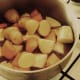 Diced vegetables are added to kangaroo stew