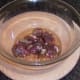 Kangaroo meat is stirred through marinade