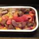 Kangaroo meat is turned through vegetables