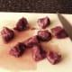 Kangaroo steak is diced for stewing