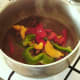 Bell pepper slices are added to kangaroo satay