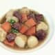 Kangaroo stew is ladled in to serving plates