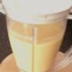 Bananas and peaches are blended with coconut milk