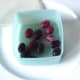 Grapes added to plastic dish for part freezing