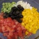 Add the vegetables to the quinoa first