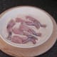 Frogs' legs are tossed in seasoned flour