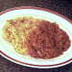 Spicy rice and curry sauce are plated