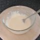 Batter is beaten with a fork