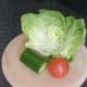Lettuce leaves, cucumber and tomato for salad