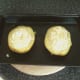 Stuffed potato halves ready for baking