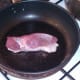 Duck breast skin is seared in dry pan