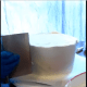 Spin the cake around a few times until your frosting is smooth enough to not pull any extra frosting off.