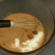 Step 4: Stir nutmeg, cinnamon, cardamom, baking powder, baking soda, and salt into the batter.