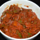 Enjoy this tangy tomato and capsicum curry!