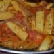 Cook the baby corn in the tomatoes and onions.