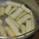 Parboil the baby corn.