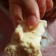 Khubz dipped in homemade hammus.