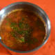 Step three: Pour the tempering on the rasam and serve. Enjoy!