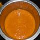 Step two: Squeeze the mango pieces to collect mango pulp