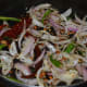 Step three: Add diced onions, green chilies, and ginger