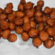 Step seven: Place the fried balls on an absorbent paper towel.