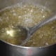 Step two: Boil the mix for 10-12 minutes on high heat, stirring occasionally.