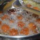 Step six: Fry these balls in medium hot oil till dark golden brown.