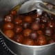 Step eight: Make more balls and immerse in the sugar syrup. They absorb the syrup and become soft and juicy. Keep aside open for 30 minutes.