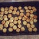 Step 7: Layer the cooked tater tots in a 13x9 baking pan.
