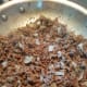Steps 3 and 4: Add onion to browned hamburger. Stir. Cook until onion is almost transparent.