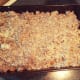 Step 8: Spread the hamburger mixture evenly on top.