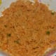 The batter for making potato pancakes. This batter is semi-solid in consistency.
