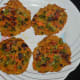 Step five: Remove them on a serving plate with the help of a flat ladle. Spicy potato pancakes are ready to serve.