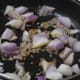 Step two: Saute cumin seeds in butter. Add chopped onions. Stir-fry till they become transparent.