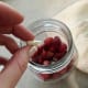 Most capsules can be opened fairly easily. Enteric coatings make it slightly harder, but not impossible.