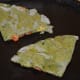 Heat a pan and place the slices on it. Add a few drops of oil or ghee on top. Roast both sides by flipping. Apply oil on the other side, too.