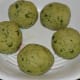 Divide the dough into six equal portions and shape them into balls.