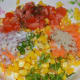 Step five: Add chaat masala and salt. Squeeze lemon. Gently mix.
