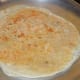 A crispy kayi holige after being cooked.