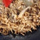 Take the fried anchovies out from the wok and set them aside.