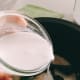 Add the diluted coconut milk into the rice mixture.