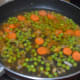 Step five: Add a cup of water. Let the mix boil for 4-5 minutes. Cover the pan with a lid. Stir occasionally.