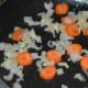 Step two: Add diced carrots. Saute for two more minutes.